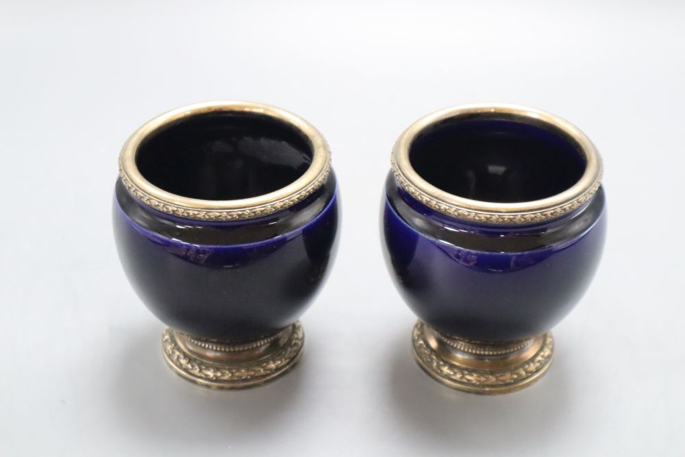 A pair of Risler & Carre silver mounted blue glazed squat vases, height 11cm